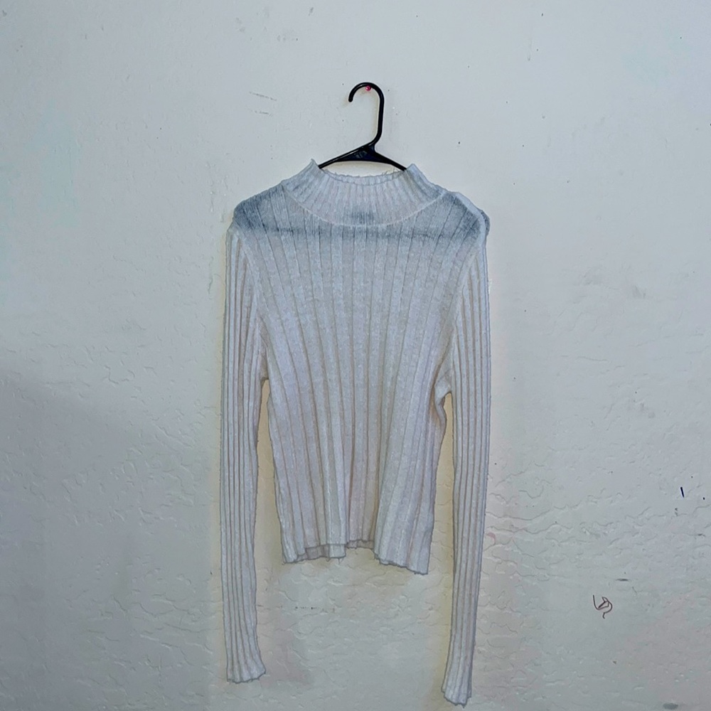 cream colored turtle neck